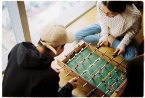 couple playing foozball